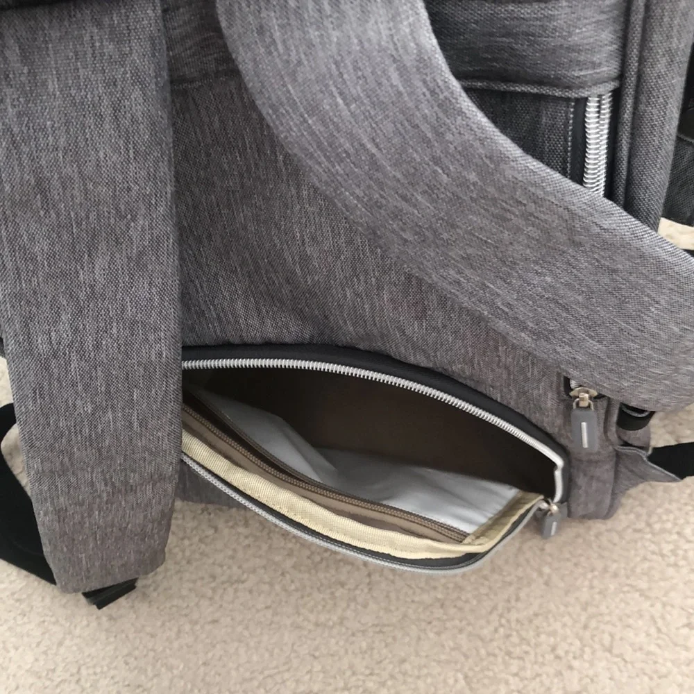 Baby changing gray backpack with multiple pockets